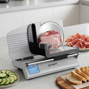 Devanti Meat Slicer Bread Vegetable 200W Silver slicing sourdough bread on a benchtop