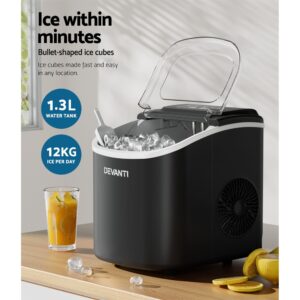 Open Lid Of Portable Ice Maker Machine Showing Fresh Bullet Ice Cubes And Scoop