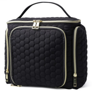 Travel makeup bag with handle showcasing its textured artisan honeycomb knit exterior
