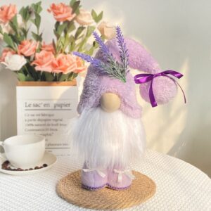 Plush lavender gnome doll festive tabletop ornament on a white mantlepiece
