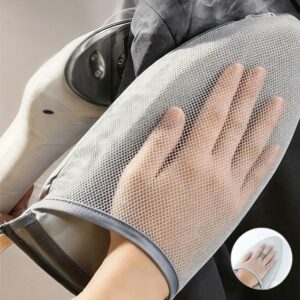 Gray Handheld Ironing Pad showing the silver heat resistant surface