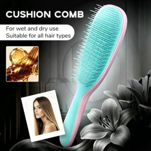 Detachable Silicone Cushion massage comb pink blue detangler resting flat on a contemporary bathroom counter.