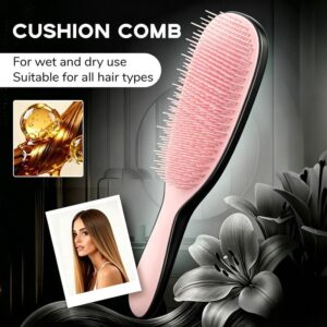 Detachable Silicone Cushion Massage Comb wet dry detangler in Black and Pink on a bathroom vanity.