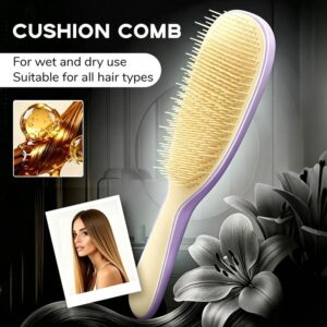 Detachable Silicone Cushion massage brush purple yellow detangler resting flat on a contemporary bathroom counter.