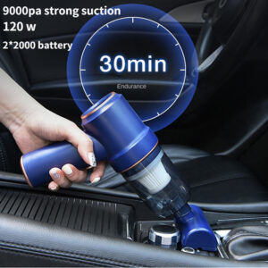 Handheld Car Vacuum With Round Nozzle Attached To The Back Blowing Dust Out Of A Keyboard.