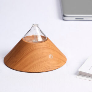 Mt Fuji Nebuliser Portable 100% Bamboo Waterless Diffuser on a bedside table