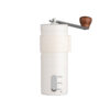 White Portable Stainless Steel Coffee Grinder Standing Upright On A Marble Kitchen Bench.