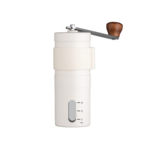 White portable stainless steel coffee grinder standing upright on a marble kitchen bench.