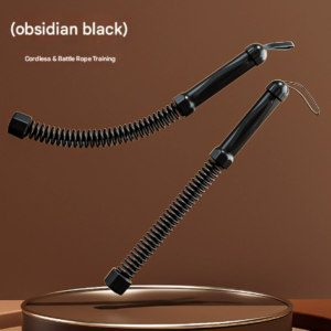 Black cordless battle rope weighted fitness rope on a gym mat.