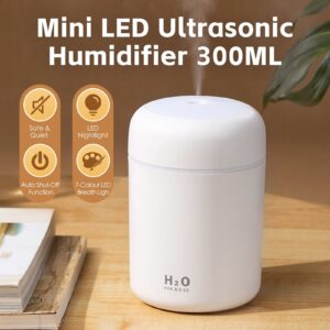 Living Today Mini LED Ultrasonic Humidifier 300ml misting on a timber bedside table
