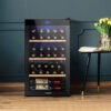 Black Devanti 34 Bottle Wine Fridge Standing Upright Filled With Wine Bottles